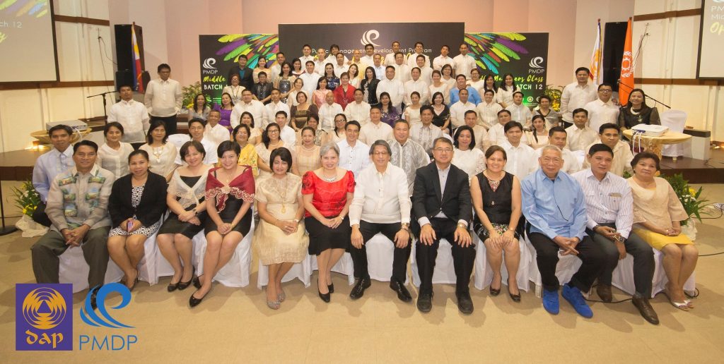 Ready to fly even higher. The PMDP unclipped the wings of 40 high-performing, high-potential middle  managers in the bureaucracy during the opening ceremony for its 12th batch last April 25 at the DAP  Conference Center in Tagaytay City.  The managers are shown here with DAP officials led by President  Antonio Kalaw Jr. and Senior Vice President for Programs Dedeng Mendoza.  (Liz Ranola) 