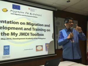 President Tony Kalaw welcomes participants to the UNDP orientation on migration and development. 2) 